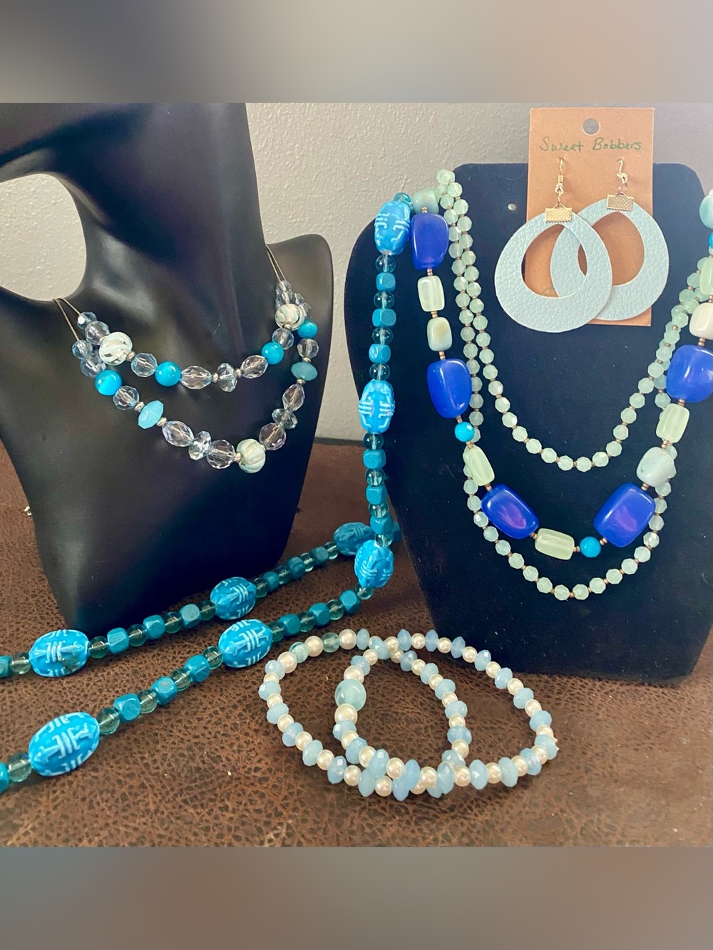Multi-strand, scarab/carved bead long strand, crystal-cut beaded necklaces blues